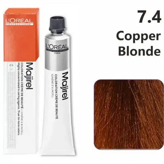 L'Oreal Majirel hair color tube with packaging and a color swatch labeled 7.4 Copper Blonde.